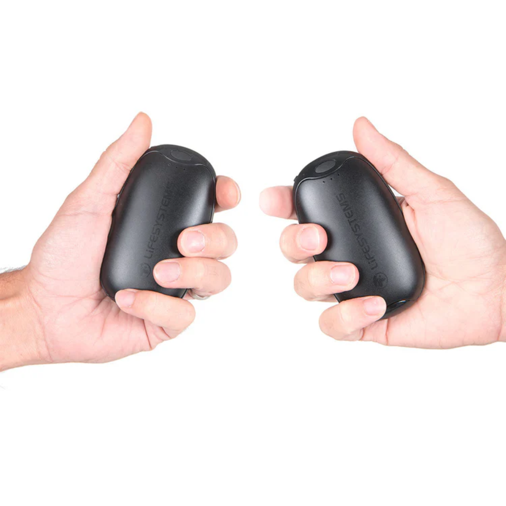 Lifesystems Dual-Palm Rechargeable Hand Warmers held in hand
