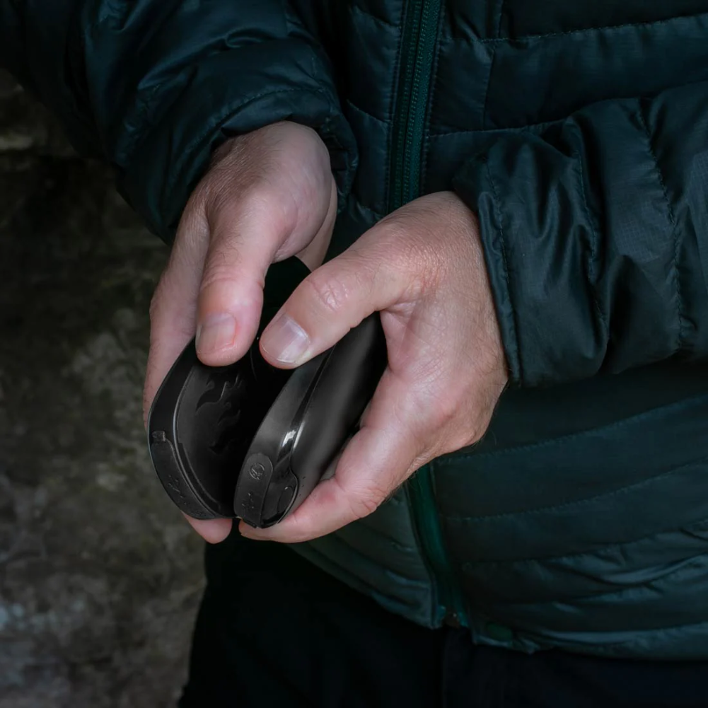 Lifesystems Dual-Palm Rechargeable Hand Warmers both in two hands