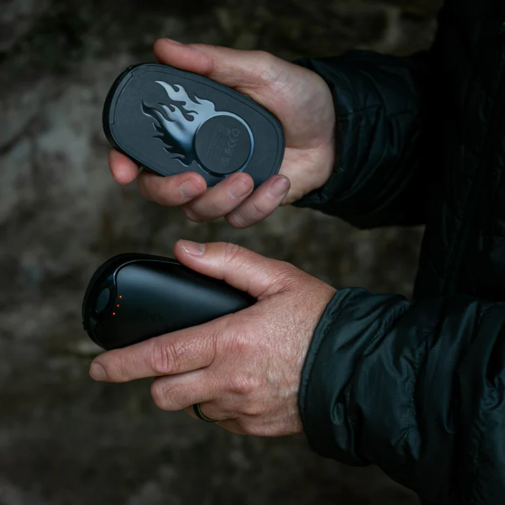Lifesystems Dual-Palm Rechargeable Hand Warmers what they look like in a man hand