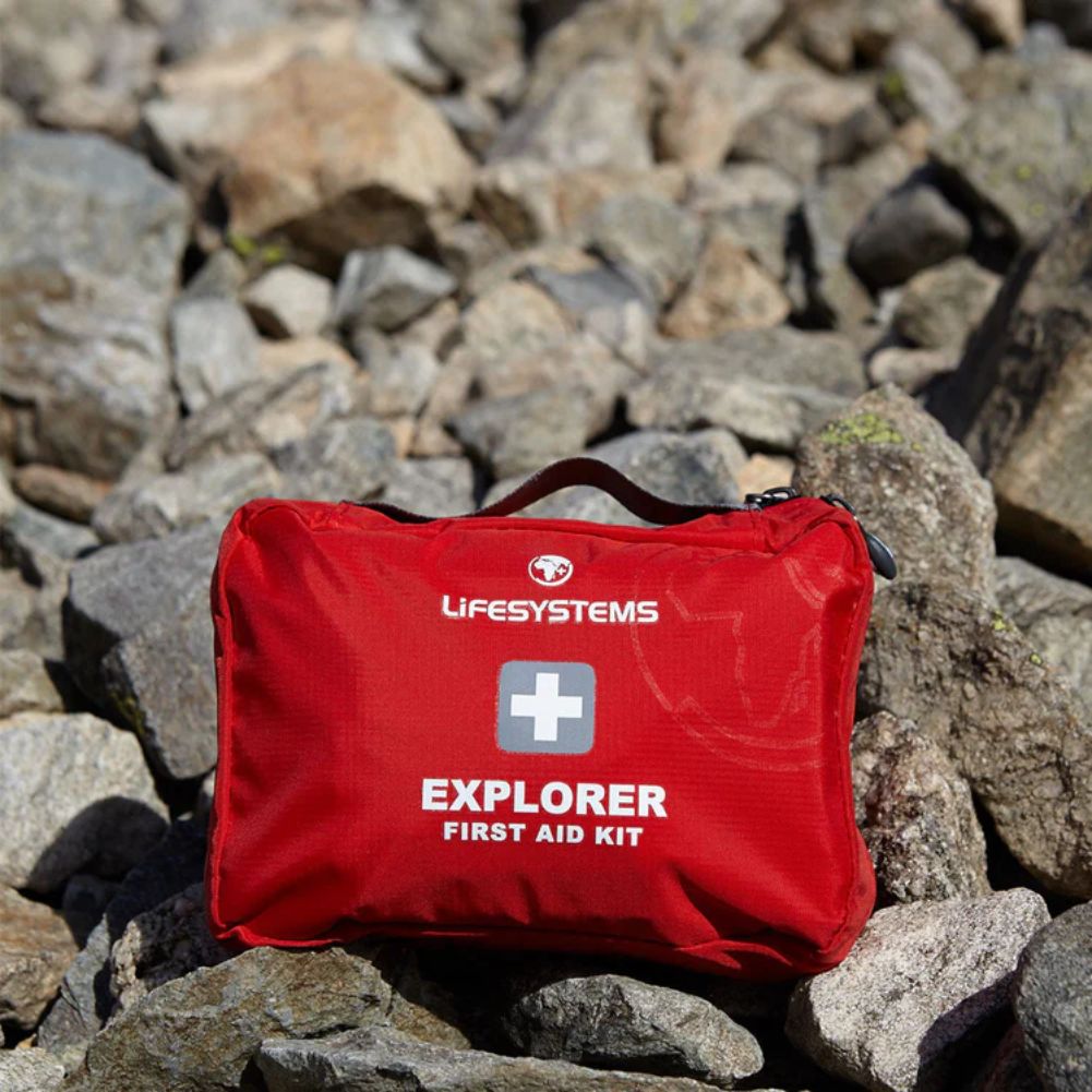Lifesystems Explorer First Aid Kit on the rocks