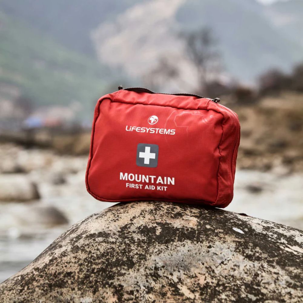 Lifesystems Mountain First Aid Kit on a rock