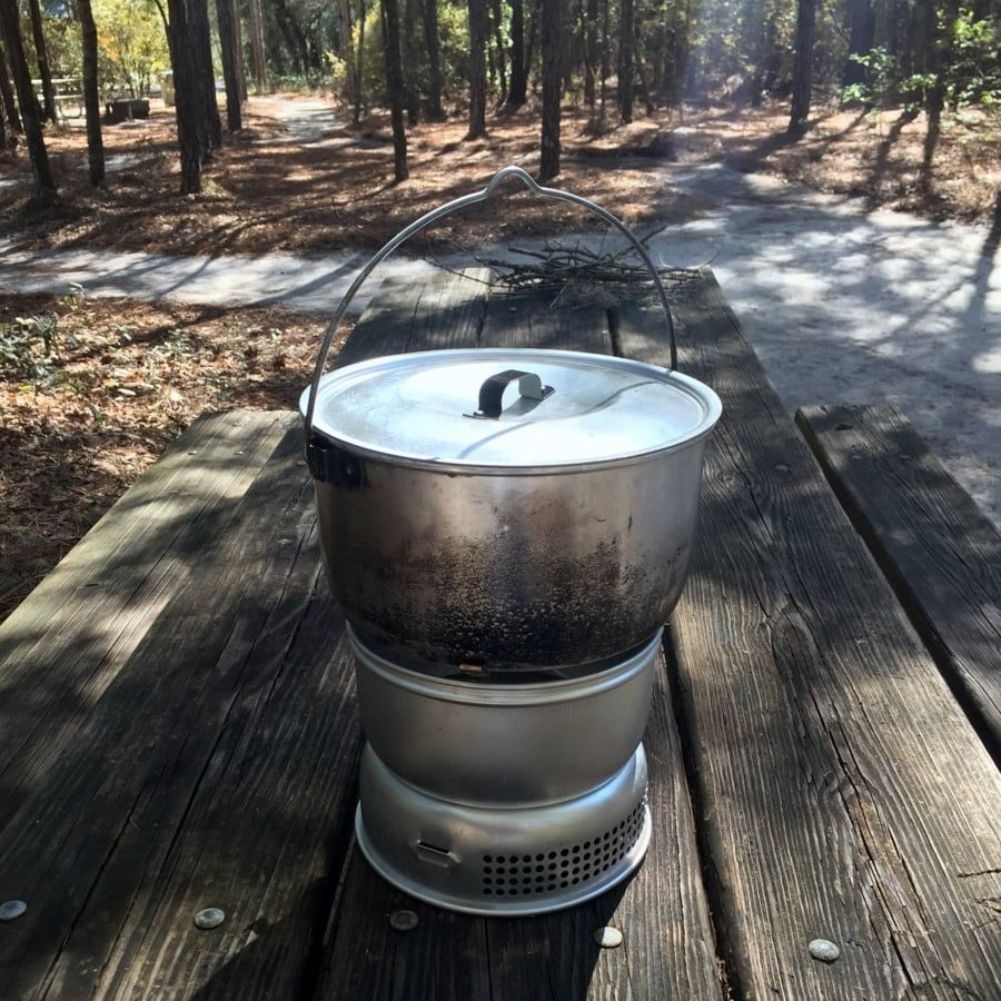 Trangia 4.5 Litre Billy Can With Lid on a bench table