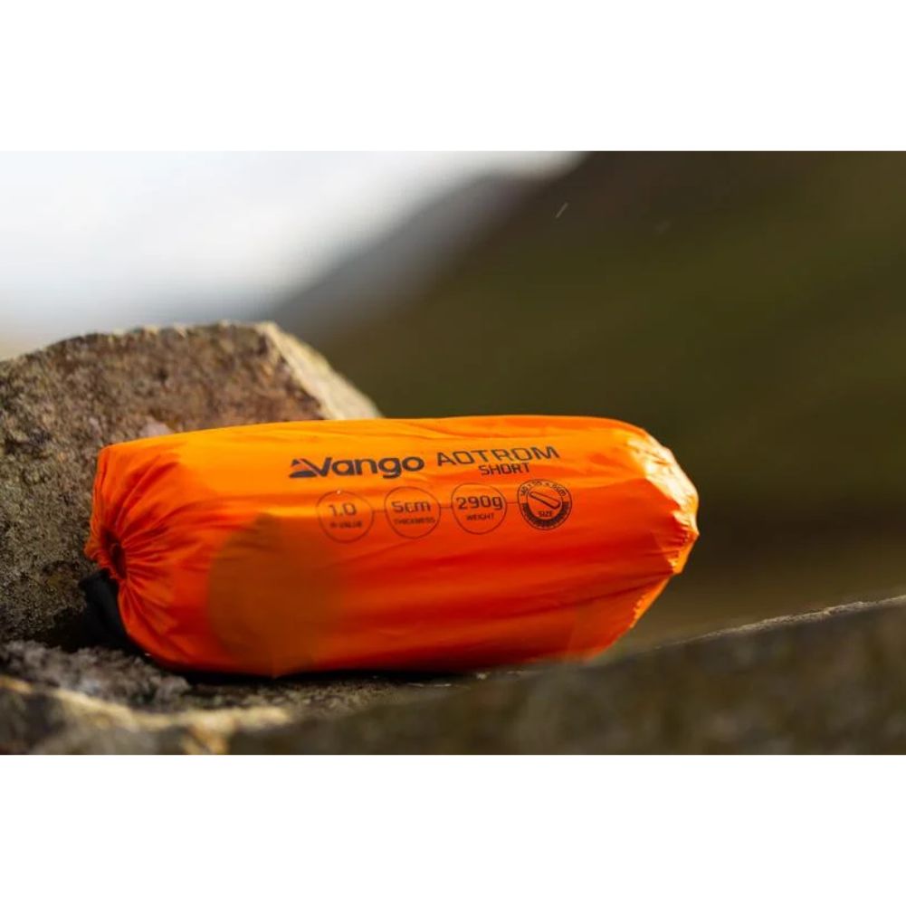 Vango Aotrom Short 5cm Sleeping Mat (Orange) on rocks