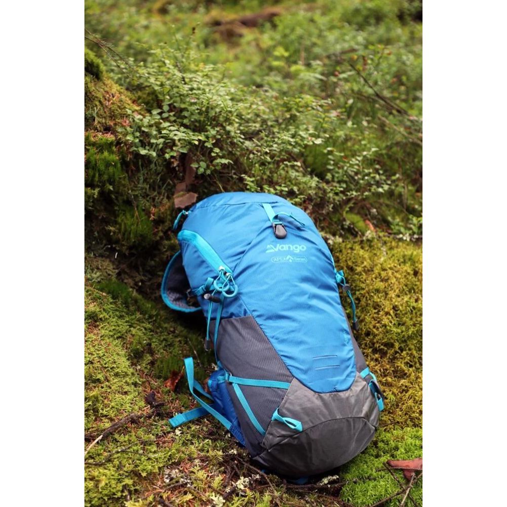 Vango Apex 25 Rucksack (Crystal Blue) on the grass