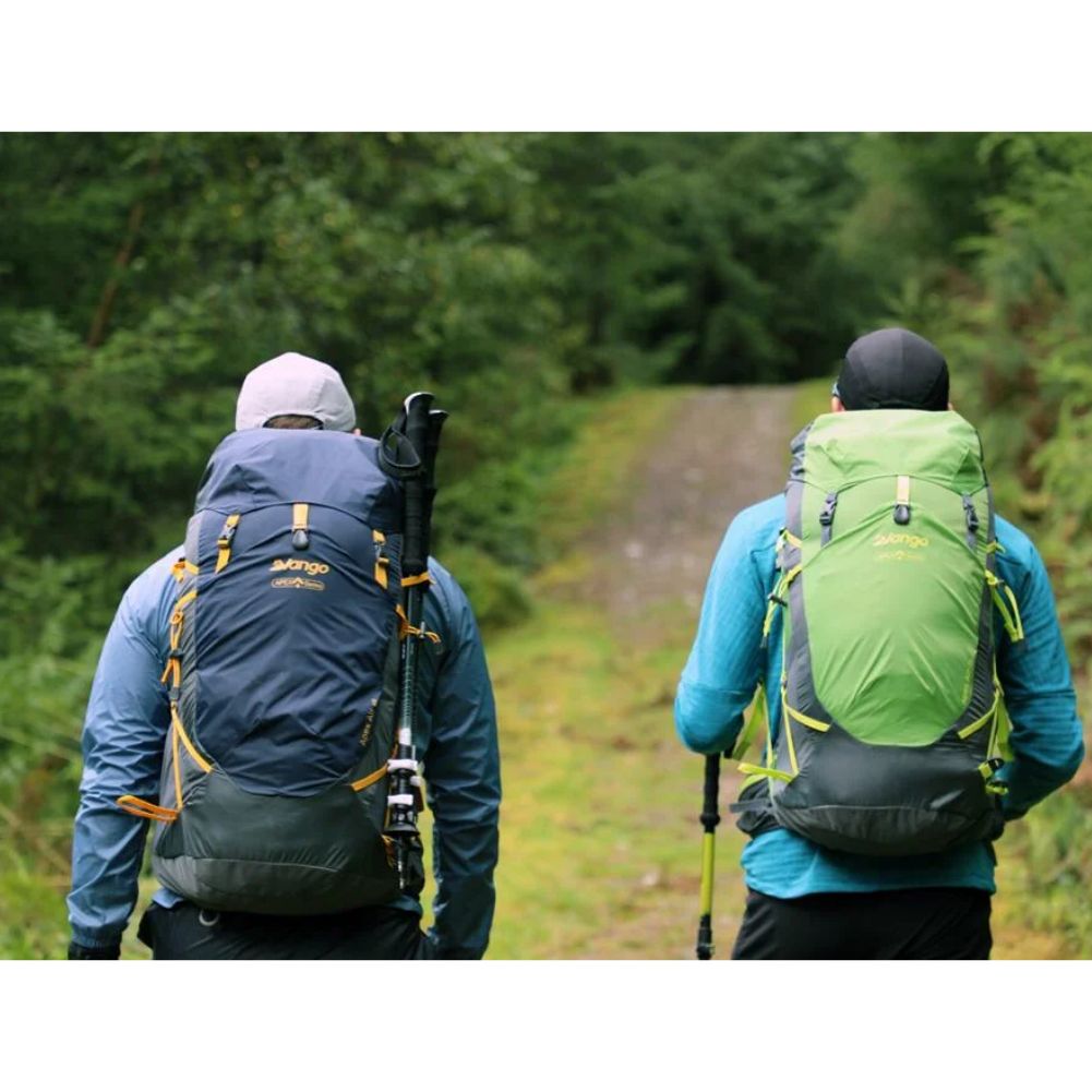 Vango Apex Air 30 Rucksack (Peridot Green) walking in the woods