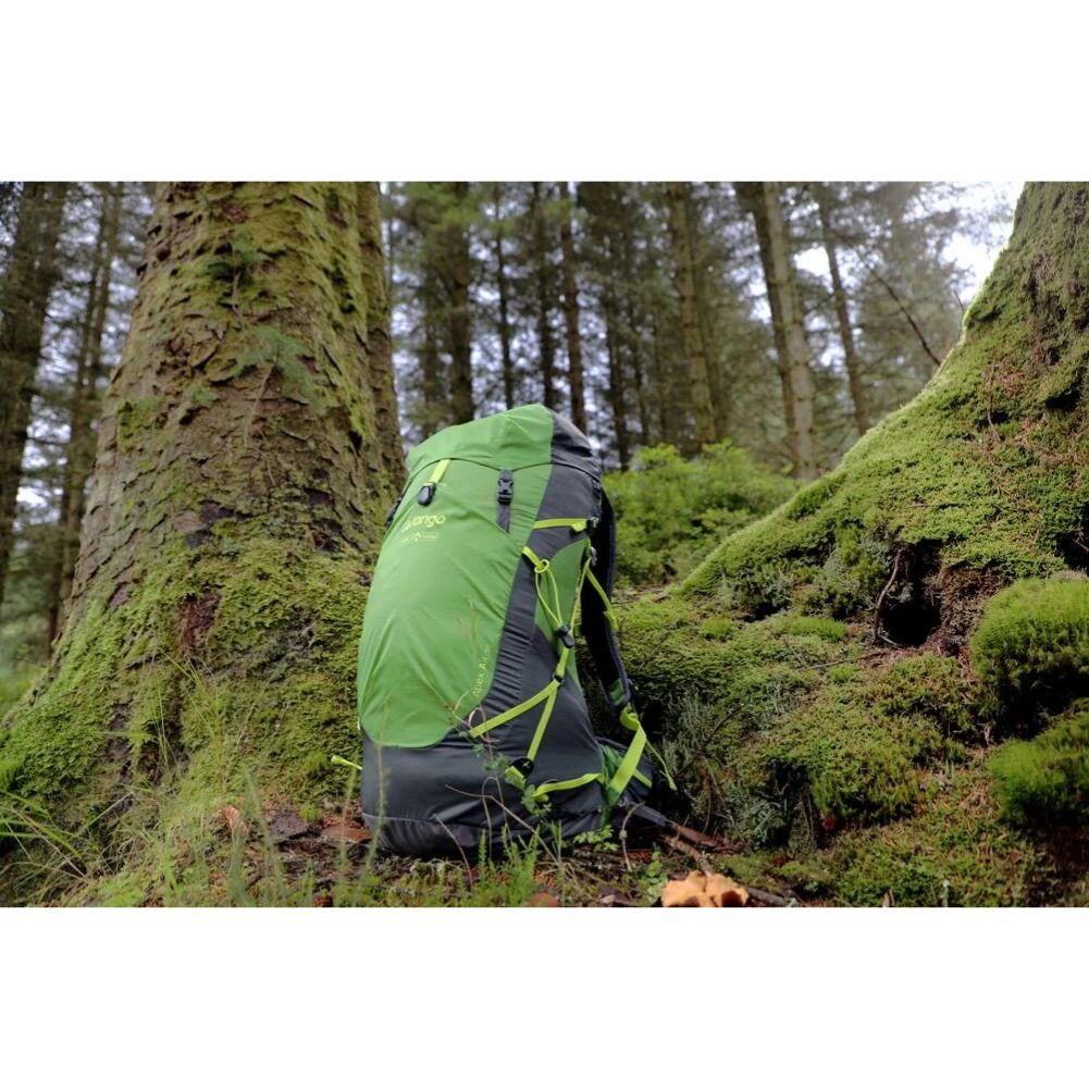 Vango Apex Air 30 Rucksack (Peridot Green) int he woods