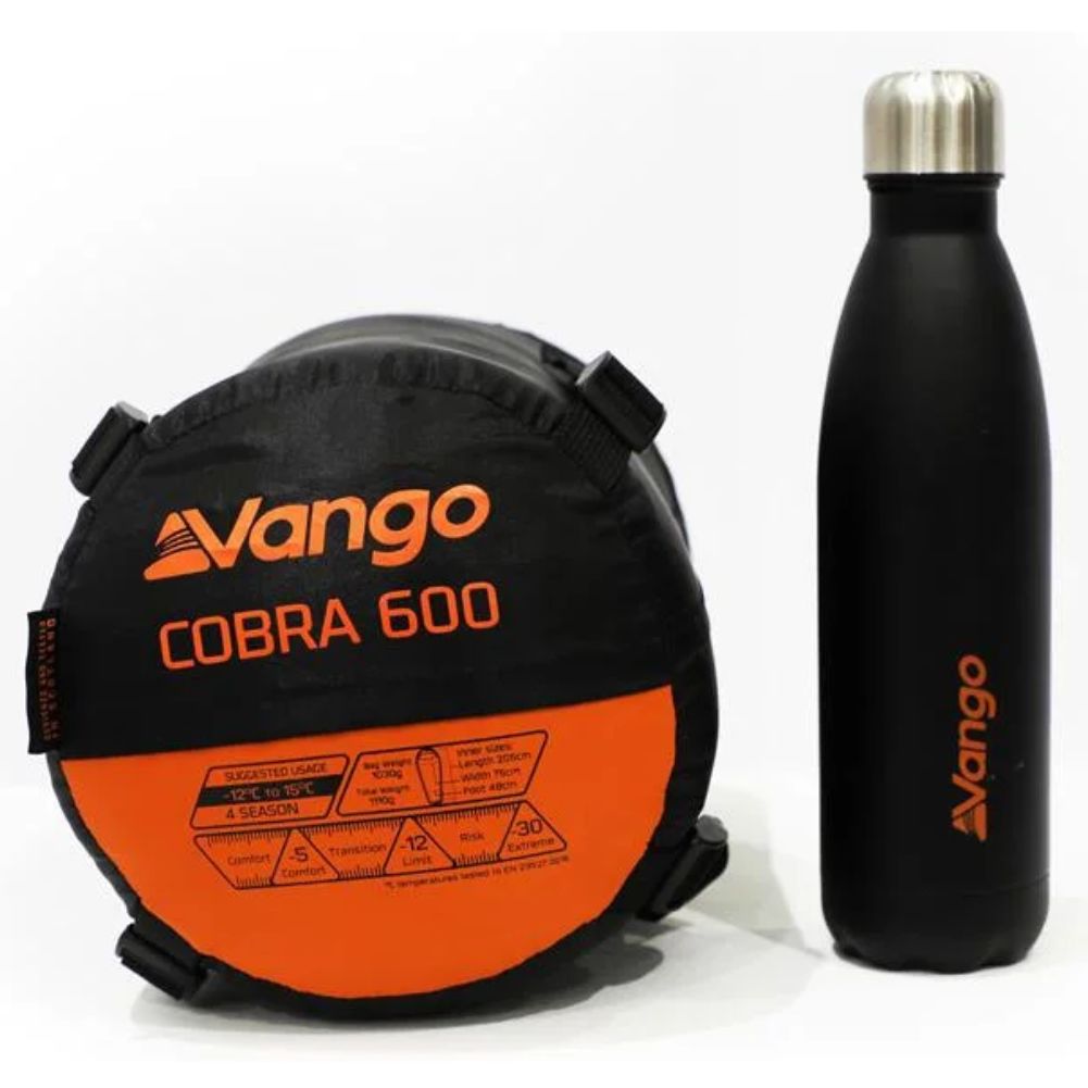 Vango Cobra 600 Down Filled Sleeping Bag (Anthracite) next to bottle