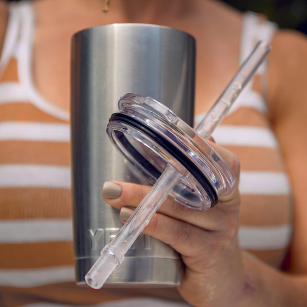 Yeti Rambler 20 OZ Tumbler Straw Lid holding lid