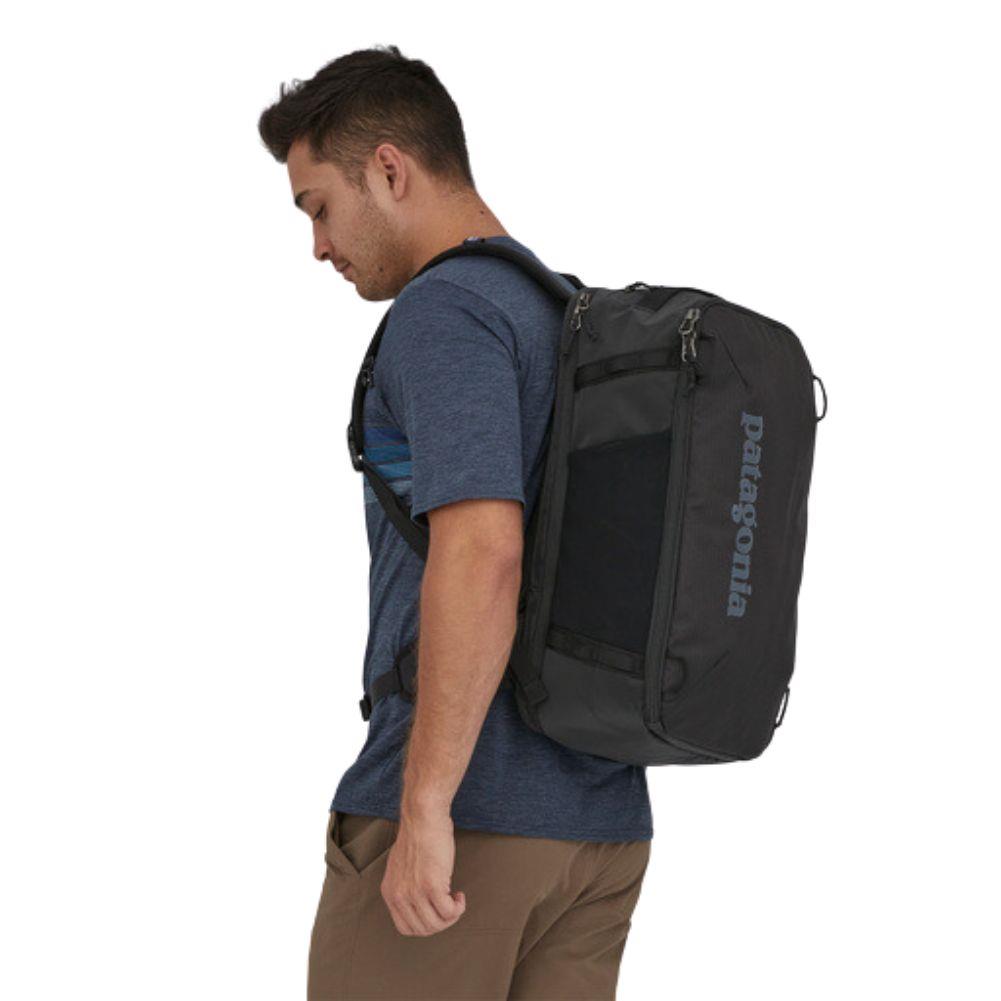 Patagonia Black Hole Mini MLC 30L (Black) model wearing angle