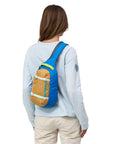 Patagonia Atom Sling Bag 8L (Patchwork/Vessel Blue) wearing it