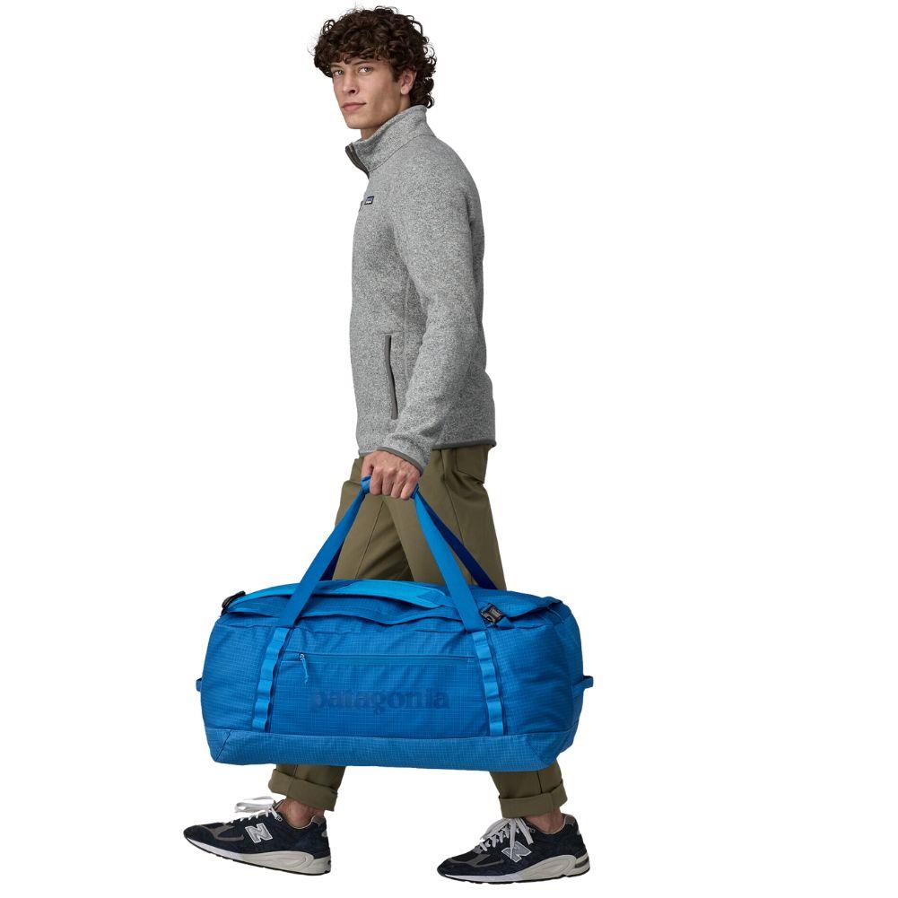 Patagonia Black Hole Duffel Bag 70L (Endless Blue) model holding