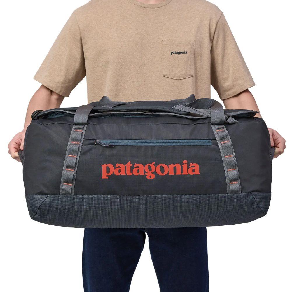 Patagonia Black Hole Duffel Bag 70L (Smoulder Blue) holding
