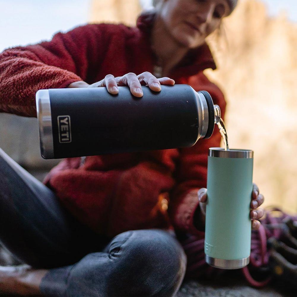 Yeti Rambler 46 OZ Bottle With Chug Cap (Seafoam) pouring