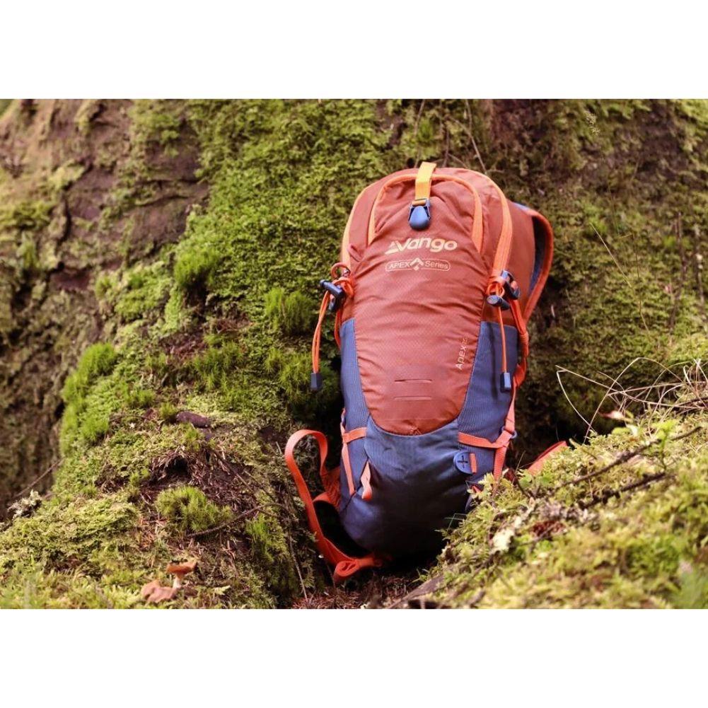 Vango Apex 15L Day Pack (Harissa) bag alone on tree
