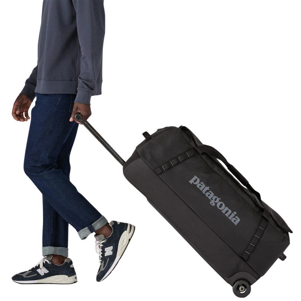 Patagonia Black Hole Wheeled Duffel Bag 100L (Black) pulling