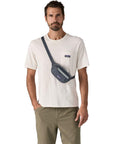 Patagonia Terravia 1L Mini Hip Pack (Smolder Blue) over shoulder