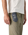 Patagonia Terravia 1L Mini Hip Pack (Smolder Blue) on the hip