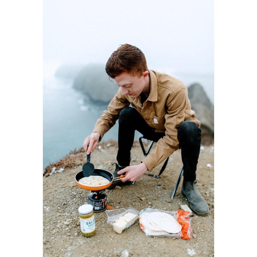 Jetboil Summit Non-Stick Camping Skillet (Orange) cooking on hill