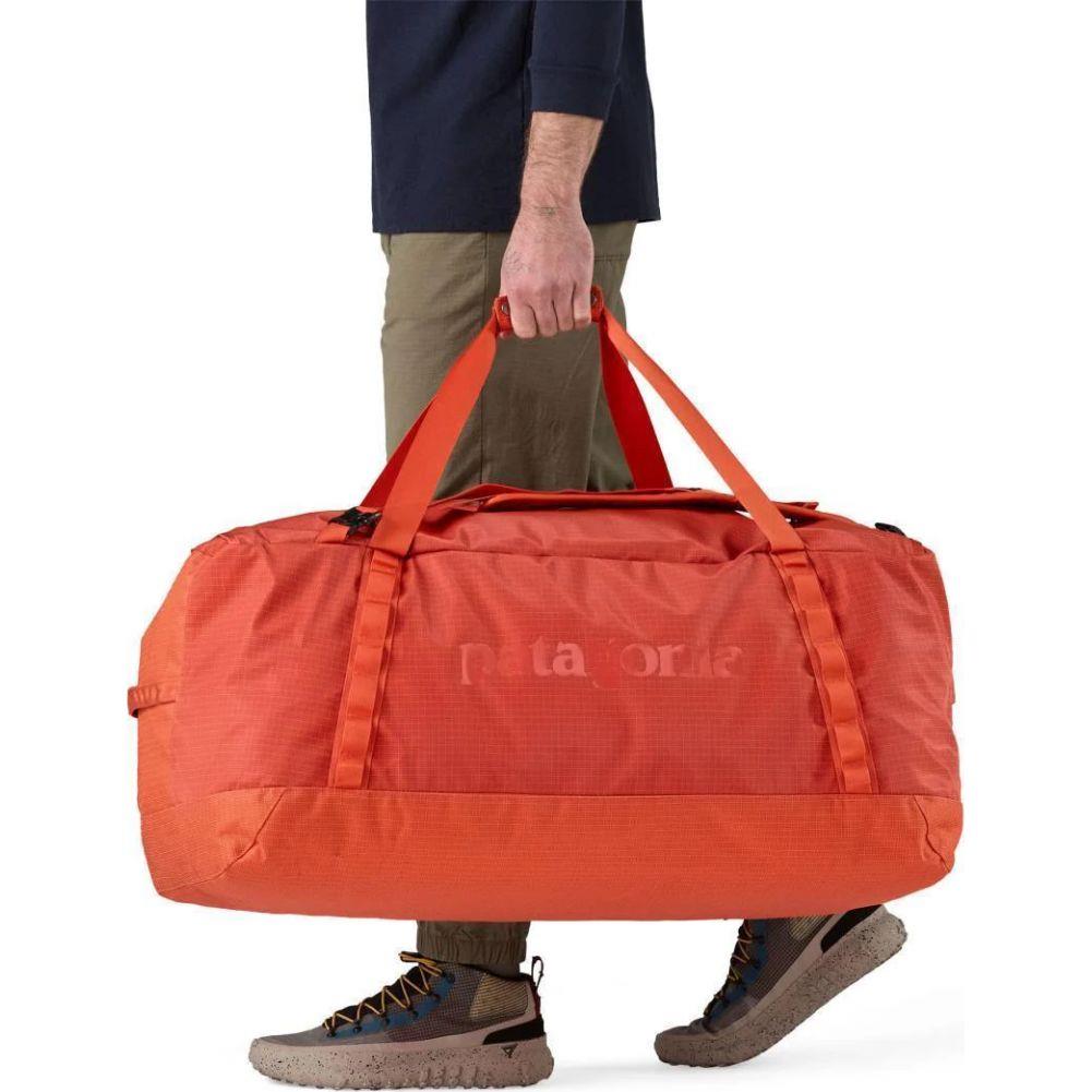 Patagonia Black Hole Duffel Bag 100L (Pollinator Orange) hand
