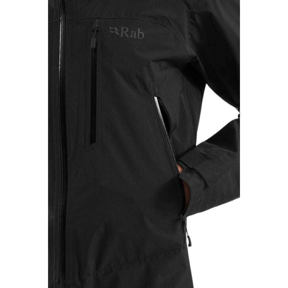Rab Men&#39;s Downpour Mountain Waterproof Jacket (Black) hand in pocket