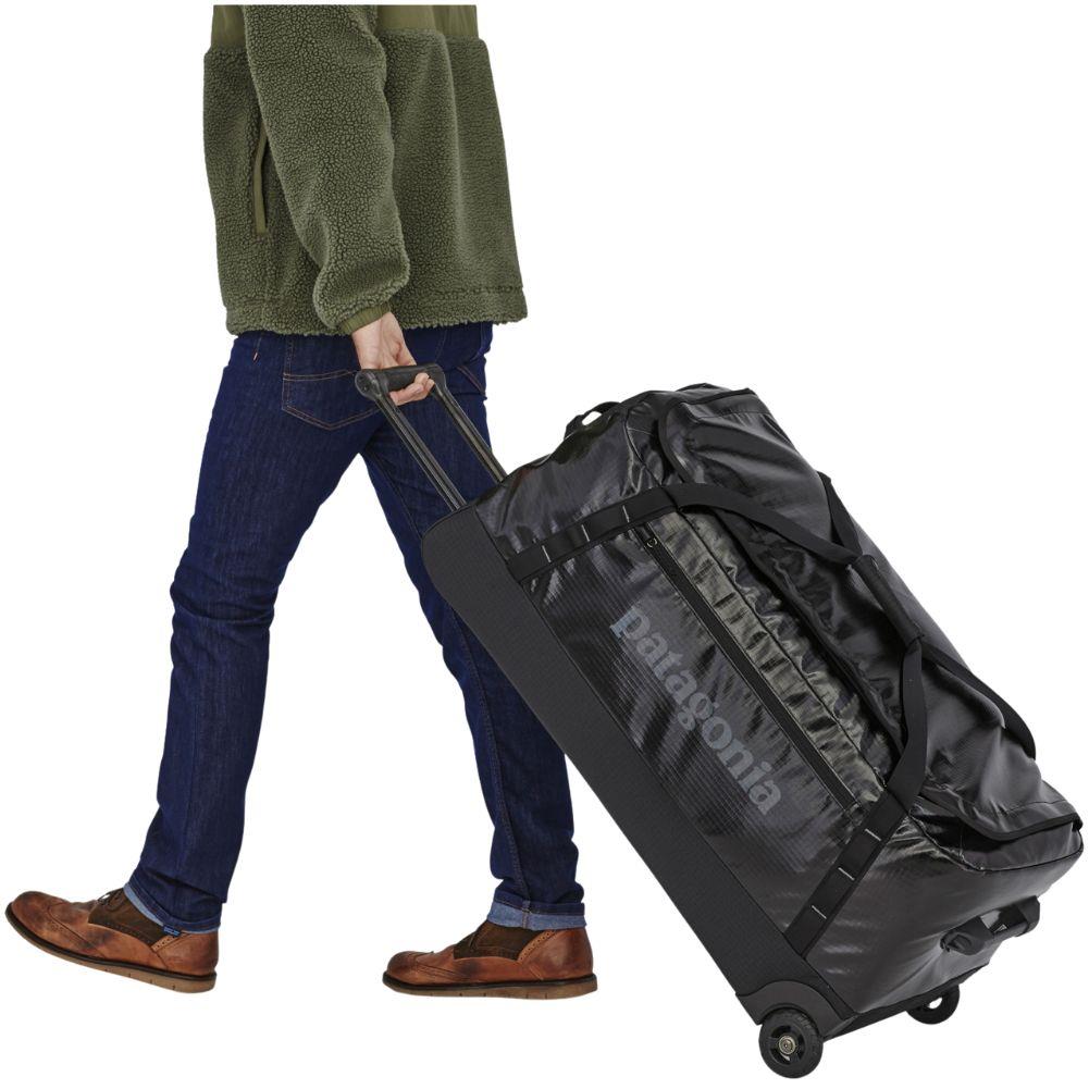 Patagonia Black Hole Wheeled Duffel 100L (Black) walking
