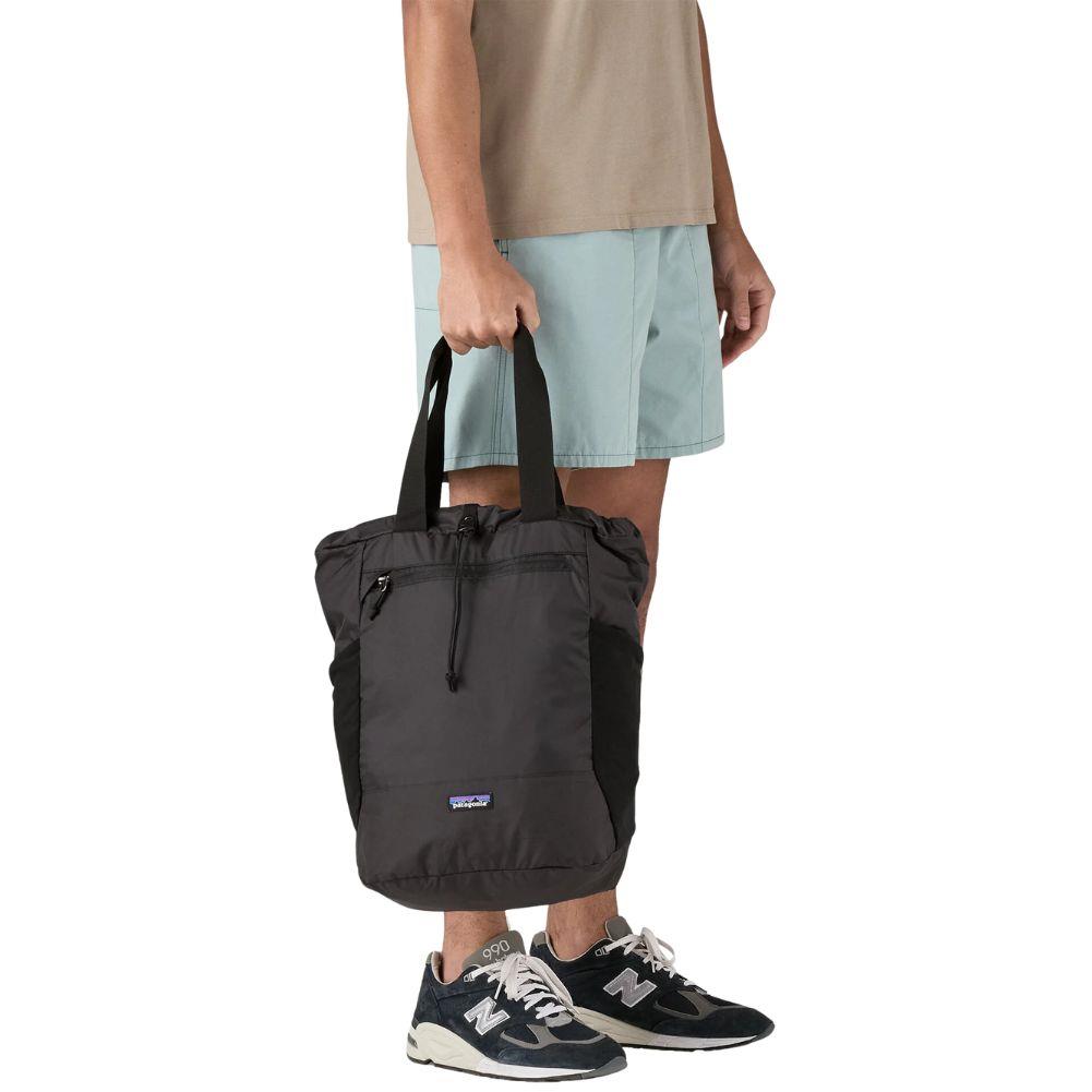 Patagonia Terravia Tote Pack 24L (Black) hand