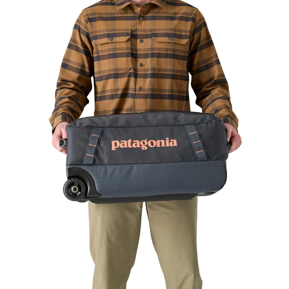 Patagonia Black Hole Wheeled Duffel 40L (Smolder Blue) holding either side