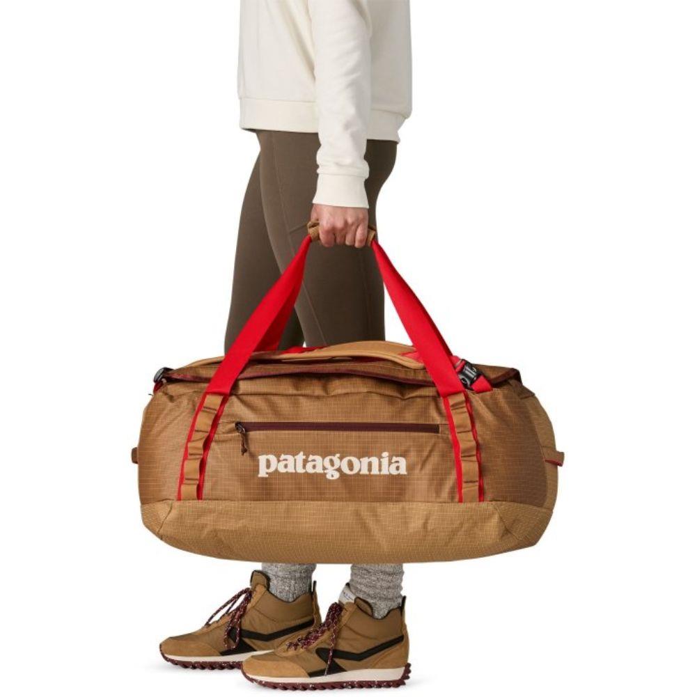 Patagonia Black Hole 55L Duffel Bag (Talon Gold) carry