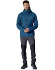 Rab Men's Downpour Mountain Waterproof Jacket (Tempest Blue) standing