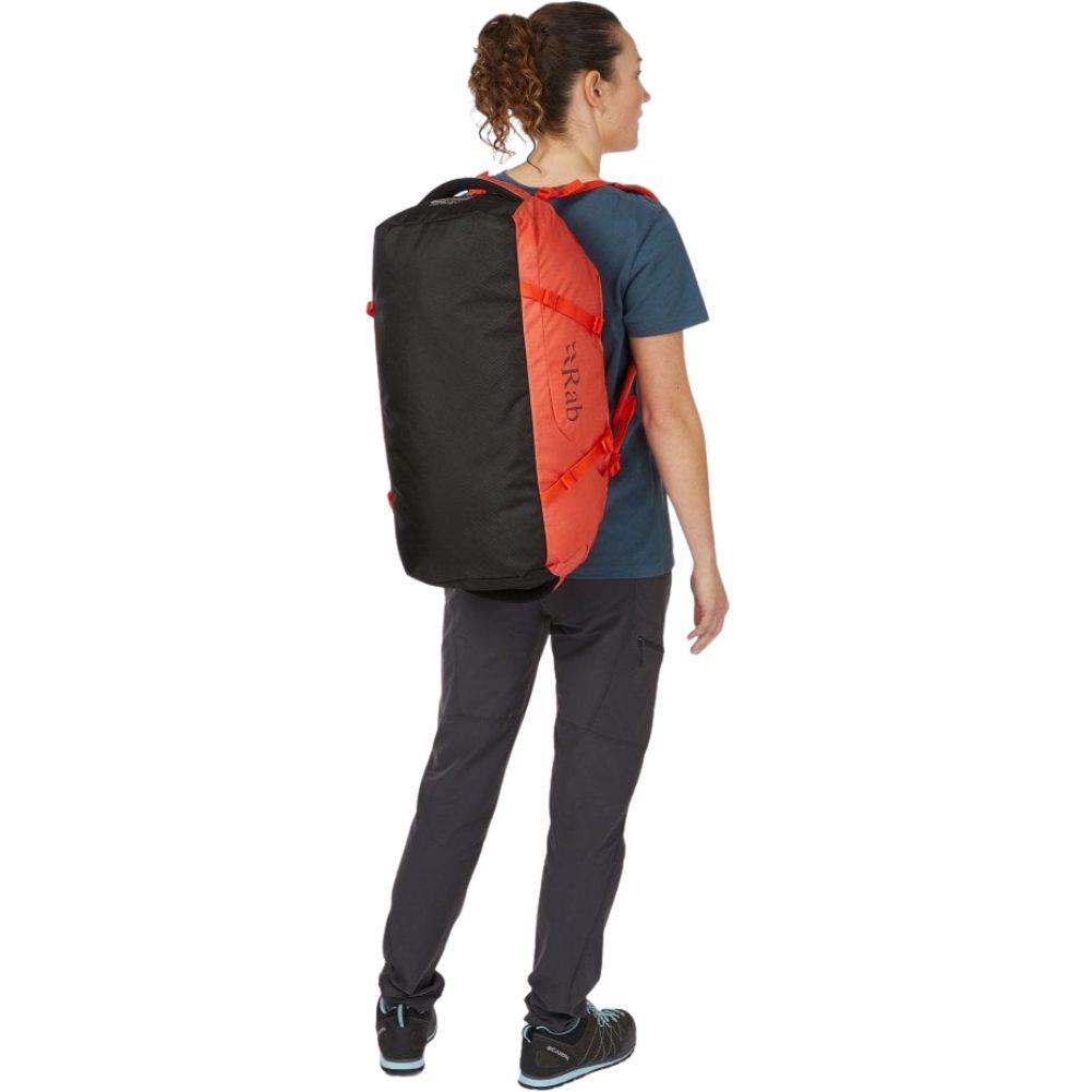 Rab Escape Kit Bag LT 30 (Red Grapefruit) woman back showing