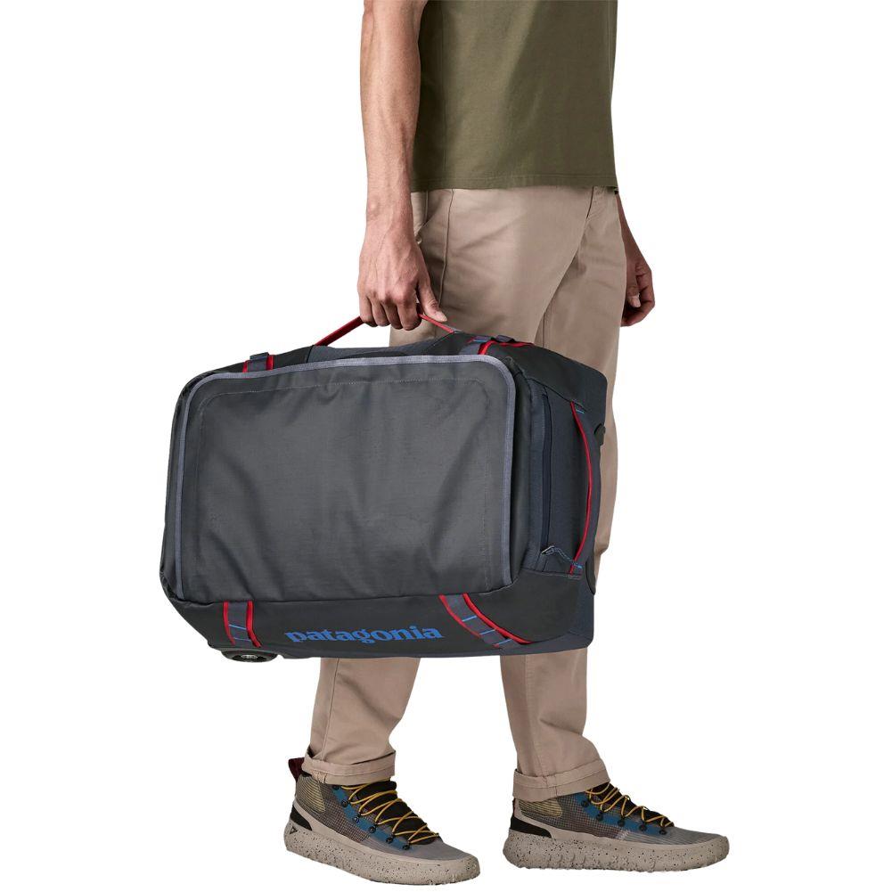 Patagonia Black Hole Wheeled Duffel 40L (Smolder Blue w/Amanita Red) holding