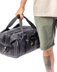 Bach Dr. Duffel 30L (Black) carrying hand