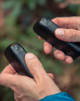 Lifesystems Dual-Magnetic Rechargeable Hand Warmers in hands