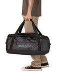 Patagonia Black Hole 55L Duffel Bag (Black w/Black) holding
