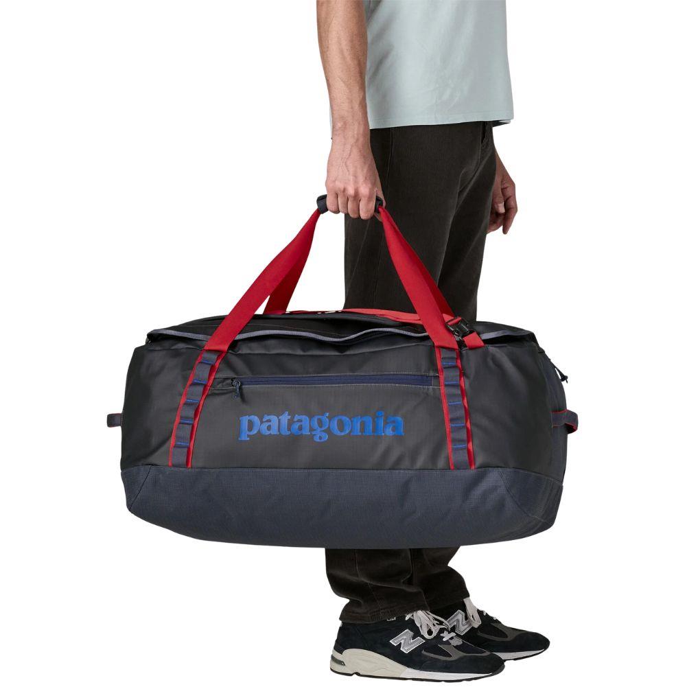Patagonia Black Hole Duffel Bag 70L (Smolder Blue w/Amanita Red) standing