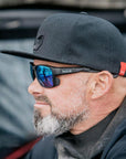 Bollé Airdrift Sunglasses - Medium (Black Matte/Volt+ Offshore Polarised) On Person